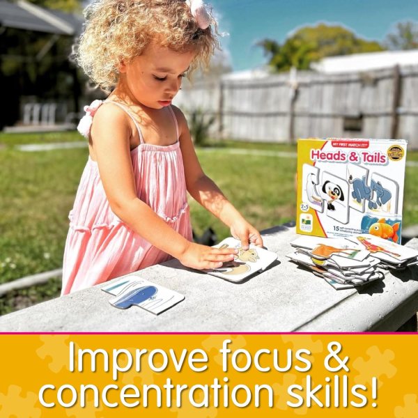 Toddler playing with animal matching puzzle learning toy award winning