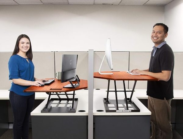 Adjustable sit-stand desk converter for ergonomic workspace setup, perfect for standing or sitting w.